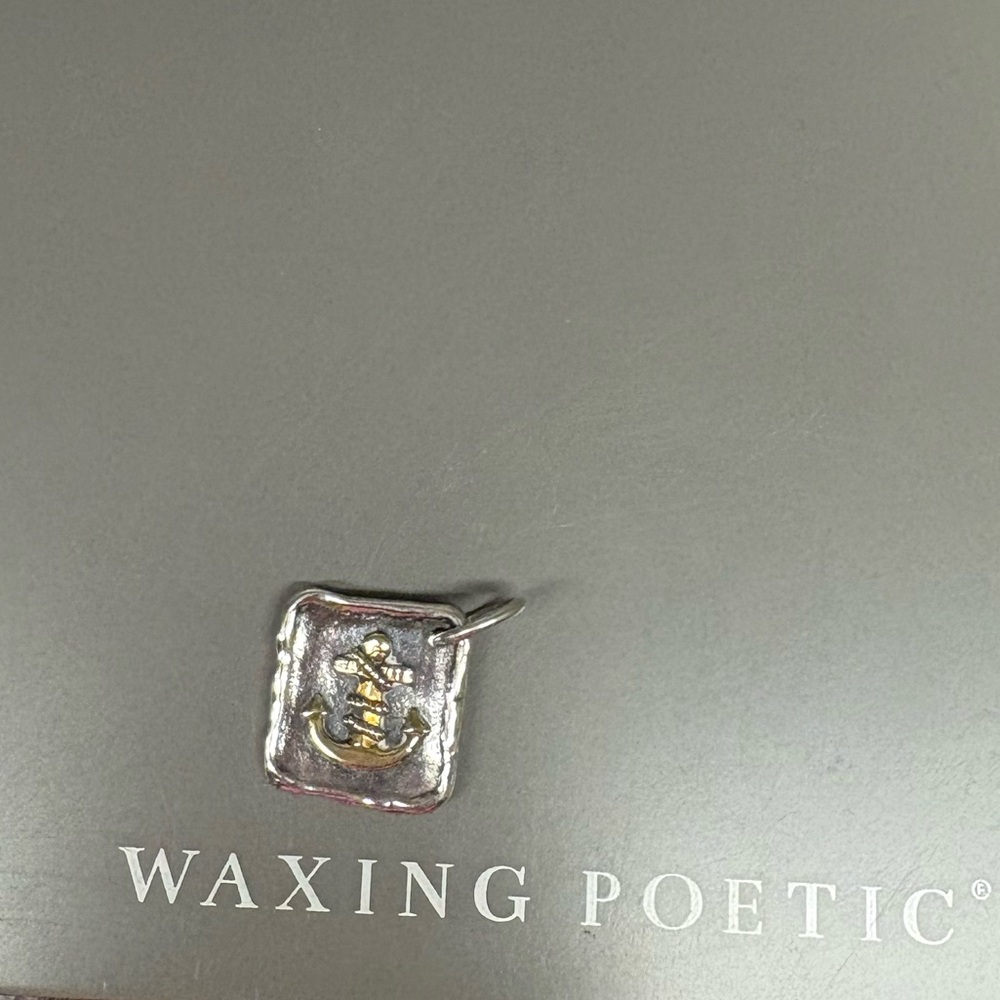 Waxing Poetic Silver and Gold Pendant